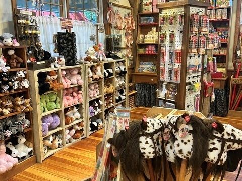 Shelves of plush toys and gifts in a Sauder Village shop